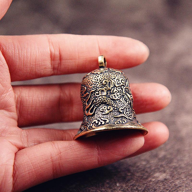Vintage Brass Bell Carved Drag - огляд і ціна Vintage Collectible Bells