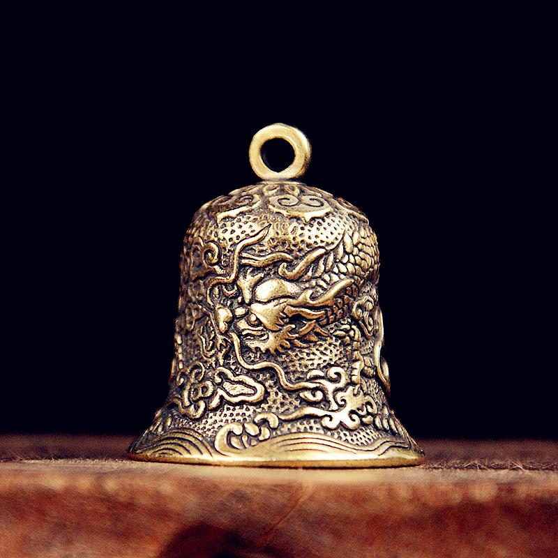 Vintage Brass Bell Carved Drag - огляд і ціна Vintage Collectible Bells