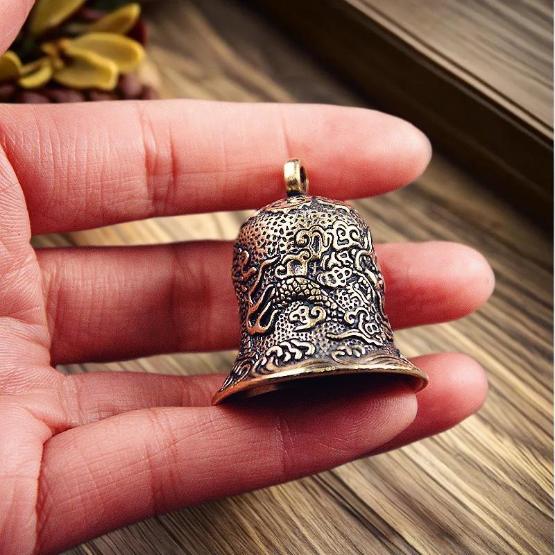 Vintage Brass Bell Carved Drag - огляд і ціна Vintage Collectible Bells